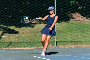 Girls Tennis won three of its four most recent matches and currently holds a 7-6 season record. Pictured: Senior player Donna Abrigo 
