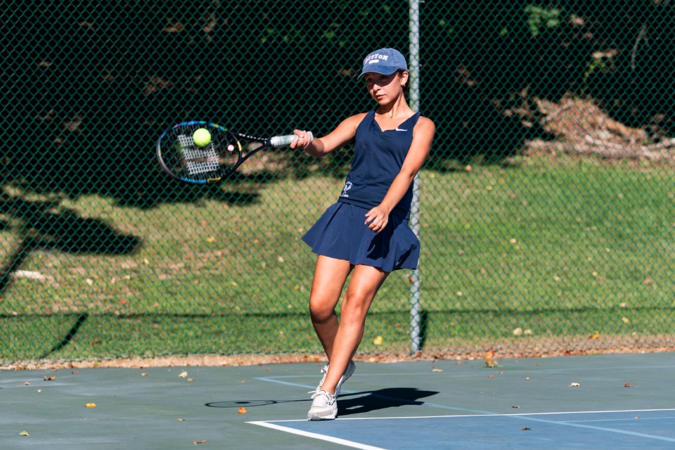 Girls Tennis won three of its four most recent matches and currently holds a 7-6 season record. Pictured: Senior player Donna Abrigo 