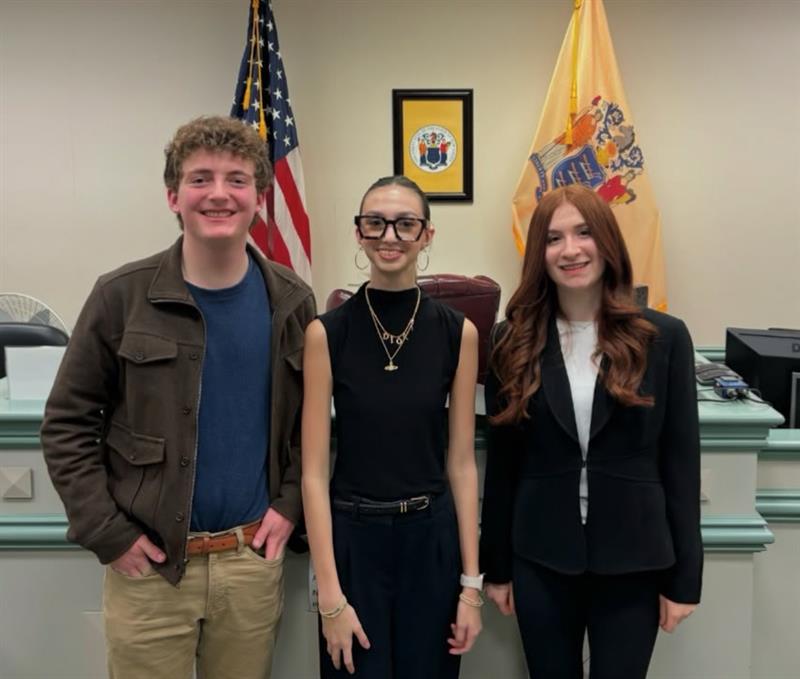 Defense witnesses for the RHS Mock Trial team pose together after defeating the opposing plaintiff team at the Morris County Courthouse on Tuesday, Jan. 7, 2025. From left: RHS graduate Ryan Schorr (’25), junior Amelia Longa and junior Grace Kellett.
