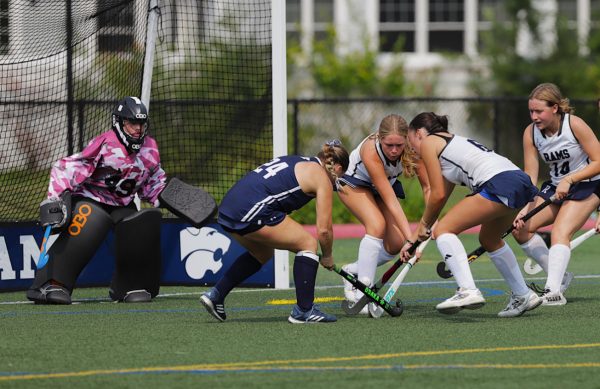 Mia Briganti looks to fend off a Chatham goal attempt on Friday, Oct. 17, 2025.