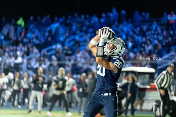 Matthew Skrapits comes down with the touchdown on the way to beating Orange 41-6 on Friday, Oct. 17, 2025.