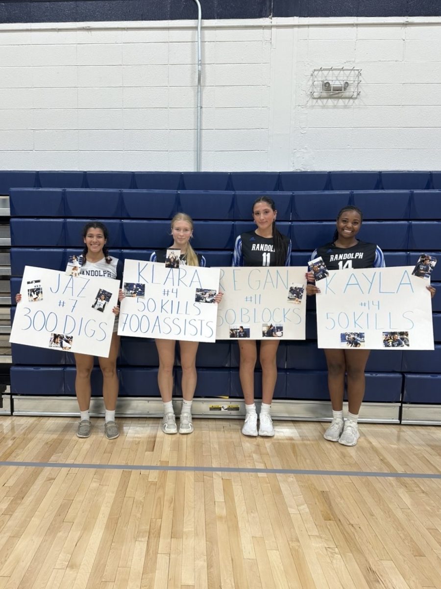 Members of the Girls Volleyball team celebrate both Senior Night and career milestones on Friday, Sept. 26, 2025. From left: Senior Jazmine Holder, junior Klara Hindson, senior Regan Galloway and senior Kayla Nowlin. 