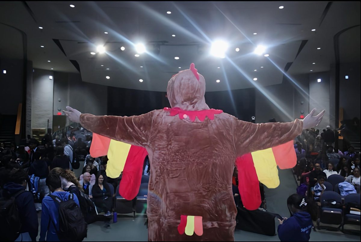 Randolph Senior Rohan Gupta introduces his turkey-themed recap video to guest debaters at the closing ceremony for the 37th Annual Fall Classic Tournament, held at the high school on Saturday, Nov. 15, 2025.
 

 