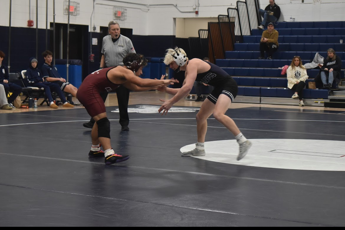 Junior captain Will Mihalko (right) won his quad match against Montville via pin, just 1:16 into the 120-pound match on Saturday, Jan. 17, 2026.  
