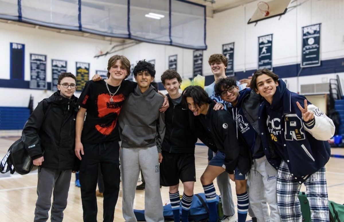 Members of the Boys Fencing Team gather before the Senior Night ceremony on Thursday, Feb. 5, 2026.  