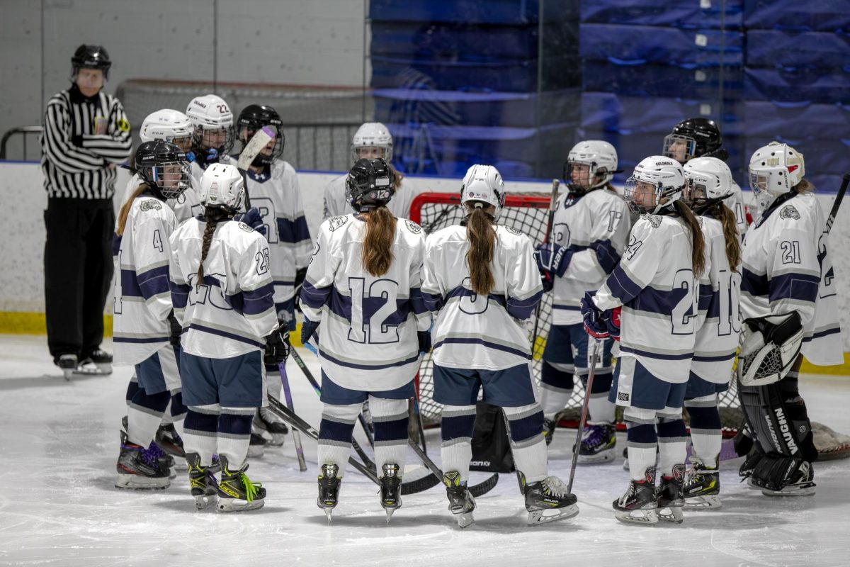 Randolph Girls Ice Hockey huddles up before a game against Pingry  on Jan. 5, 2026. 