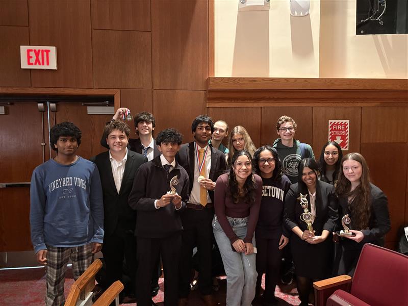 Competitors at the NJSDL State Tournament pose with their awards, celebrating both their achievements and the experience.    