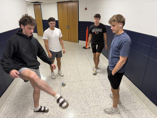 RHS seniors (from left) Justin Swayze, Louis LoVerde, Joey Sommer and Connor Decker play a round of Hacky Sack on Wednesday, May 27, 2026.