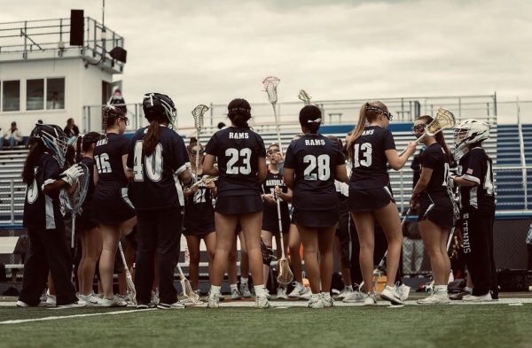 The Girls Lacrosse team huddles before facing Roxbury on Fan Appreciation Night on Thursday, May 14, 2026.